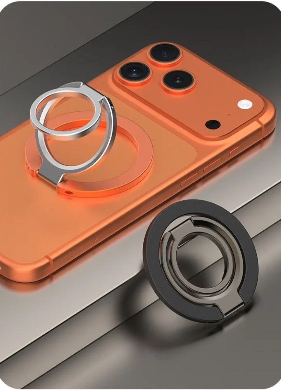 Kickform Grip in Orange on phone with Black grip